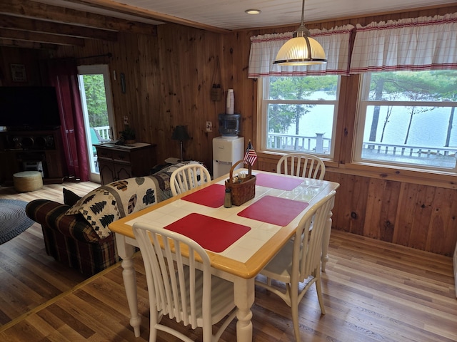 101 Brooks & Dunn Road, Otis, ME 04605 - dining room with wooden walls and light wood finished floors