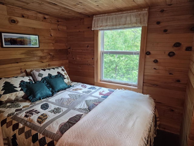 101 Brooks & Dunn Road, Otis, ME 04605 - bedroom with wooden walls and wooden ceiling