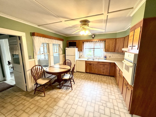 187 Maine Ave, Millinocket, ME 04462 - kitchen with white appliances, brick patterned floors, ceiling fan, light countertops, and a sink