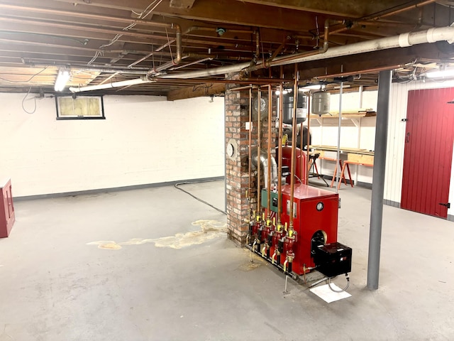 187 Maine Ave, Millinocket, ME 04462 - unfinished basement featuring a heating unit
