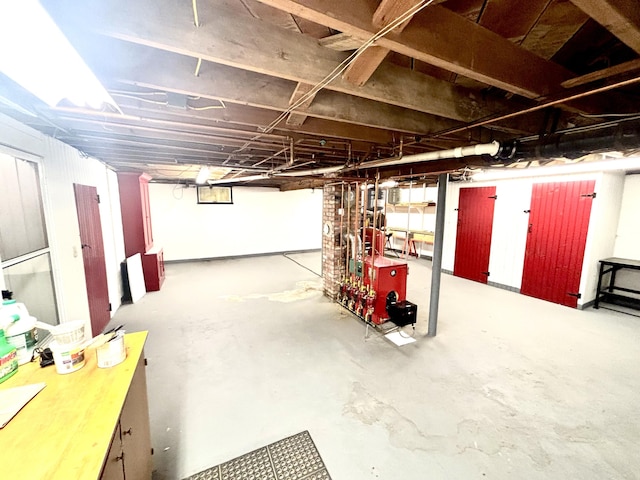 187 Maine Ave, Millinocket, ME 04462 - unfinished below grade area with a heating unit