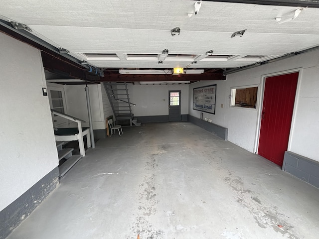 187 Maine Ave, Millinocket, ME 04462 - garage with a garage door opener