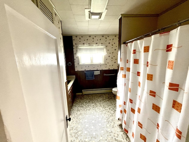 187 Maine Ave, Millinocket, ME 04462 - bathroom featuring a baseboard radiator, wallpapered walls, toilet, tile patterned floors, and a shower with curtain