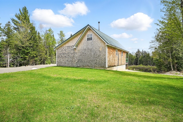 30 Bassett Ln, Moscow, ME 04920 - view of side of property featuring a lawn