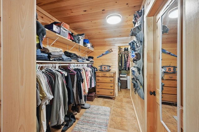 30 Bassett Ln, Moscow, ME 04920 - walk in closet featuring light stone finish flooring