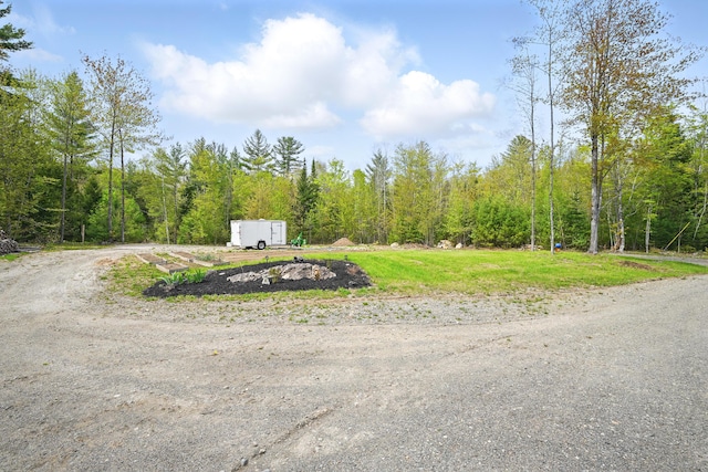 30 Bassett Ln, Moscow, ME 04920 - view of road featuring a view of trees