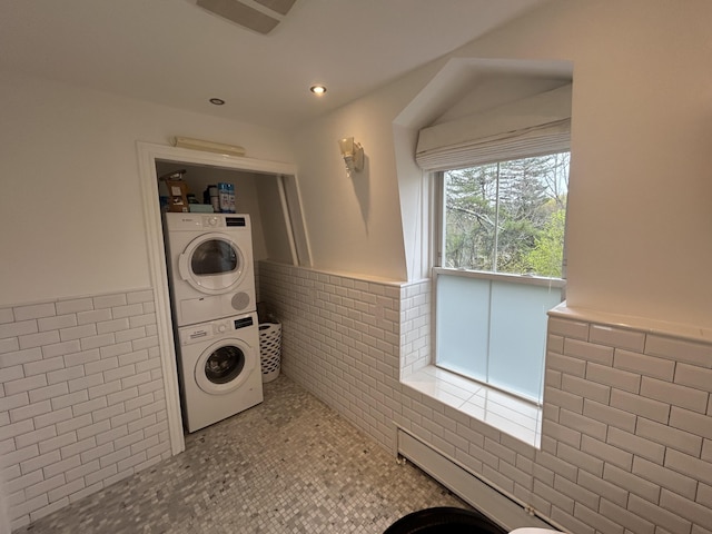 67 Pascal Ave, Rockport, ME 04856 - laundry area featuring tile walls, stacked washer / drying machine, wainscoting, and recessed lighting