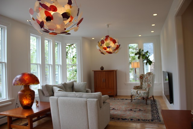67 Pascal Ave, Rockport, ME 04856 - living room with recessed lighting, wood finished floors, and a baseboard radiator