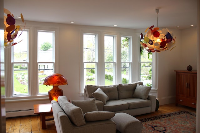 67 Pascal Ave, Rockport, ME 04856 - living room featuring a baseboard heating unit, healthy amount of natural light, wood-type flooring, and recessed lighting