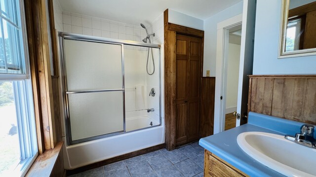 103 Water St, Machias, ME 04654 - bathroom with combined bath / shower with glass door, vanity, and tile patterned floors
