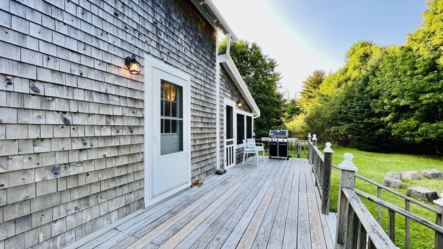 103 Water St, Machias, ME 04654 - wooden terrace with a grill and a yard