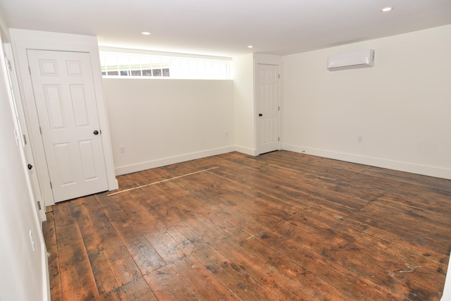 33 Main St, Cornish, ME 04020 - unfurnished room featuring a wall mounted air conditioner, hardwood / wood-style flooring, baseboards, and recessed lighting