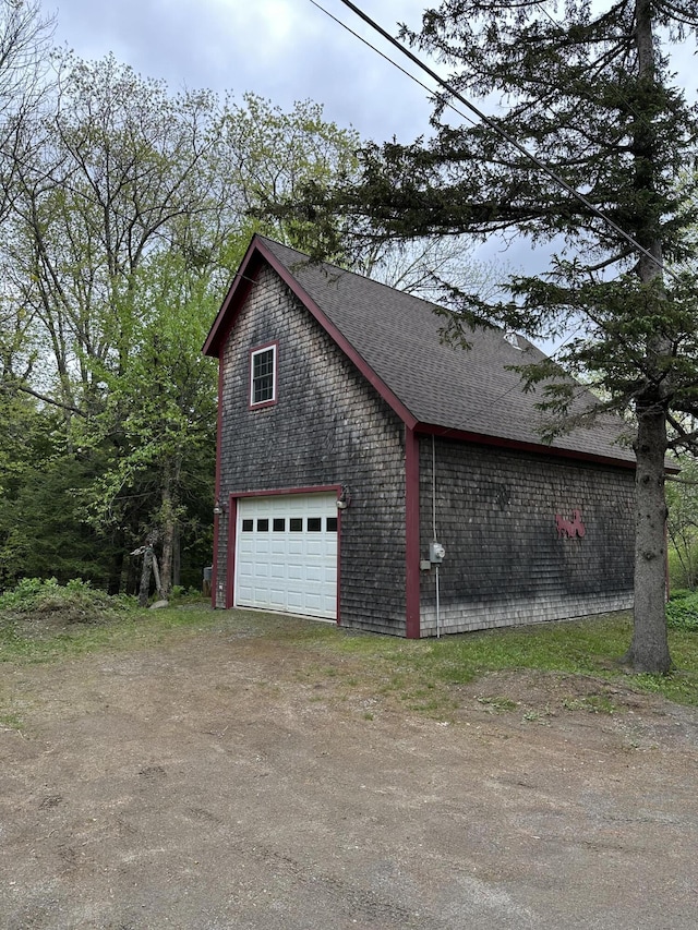 217 Jackson Rd, Monroe, ME 04951 - view of side of home with dirt driveway and a shingled roof