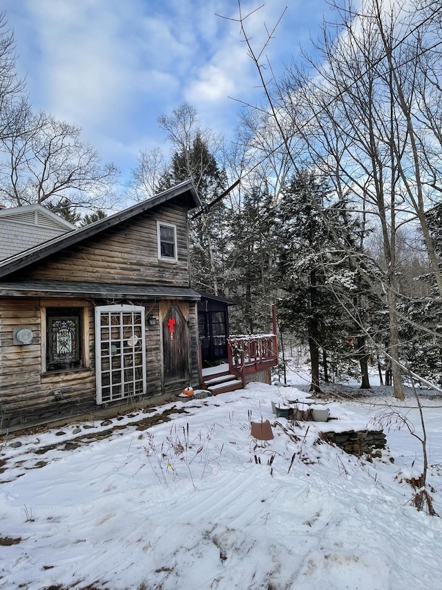 217 Jackson Rd, Monroe, ME 04951 - view of snowy exterior with a deck