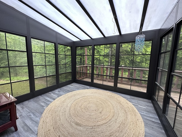 217 Jackson Rd, Monroe, ME 04951 - sunroom / solarium featuring vaulted ceiling, a deck, and wood finished floors