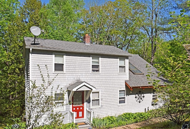 217 Jackson Rd, Monroe, ME 04951 - view of front of home with a shingled roof and a chimney