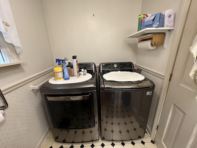 217 Jackson Rd, Monroe, ME 04951 - laundry room with washing machine and clothes dryer and tile patterned floors