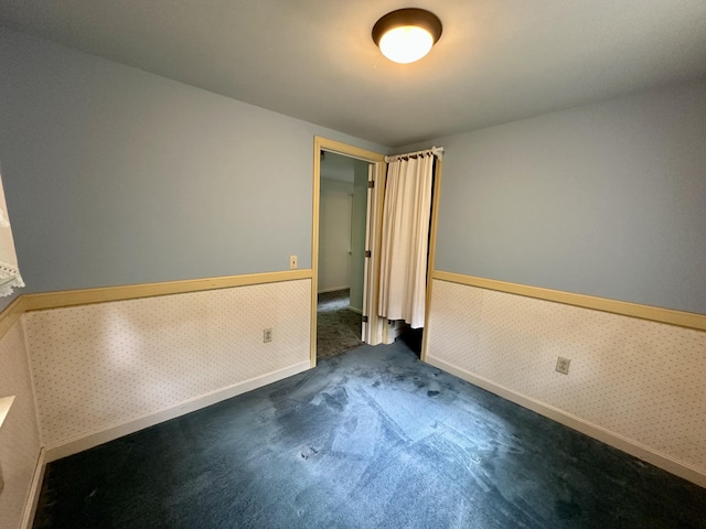 217 Jackson Rd, Monroe, ME 04951 - carpeted empty room with wainscoting and baseboards
