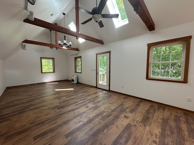 217 Jackson Rd, Monroe, ME 04951 - empty room featuring a skylight, beamed ceiling, ceiling fan, wood finished floors, and high vaulted ceiling