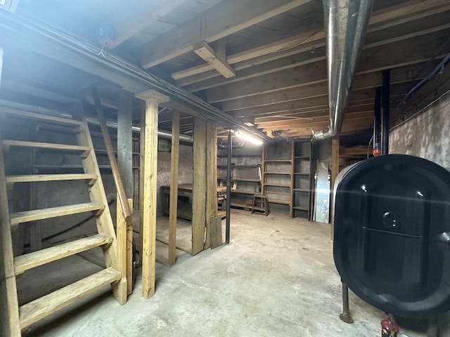 217 Jackson Rd, Monroe, ME 04951 - unfinished below grade area with stairs and oil tank