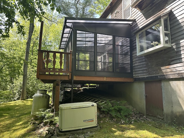 217 Jackson Rd, Monroe, ME 04951 - wooden deck with a sunroom