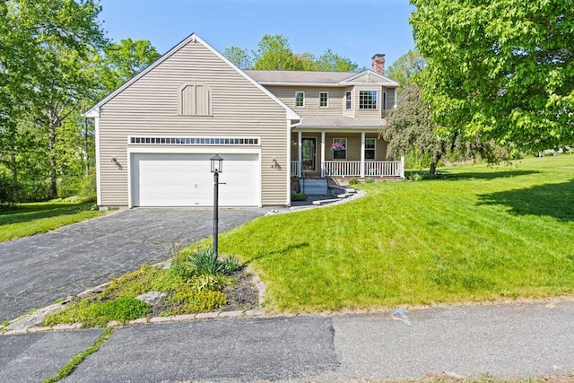43 W Lynne Ave, Portland, ME 04103 - view of front of property with a porch, a chimney, a front lawn, driveway, and an attached garage