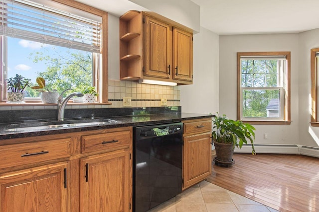 43 W Lynne Ave, Portland, ME 04103 - kitchen featuring dishwasher, a sink, brown cabinetry, and tasteful backsplash
