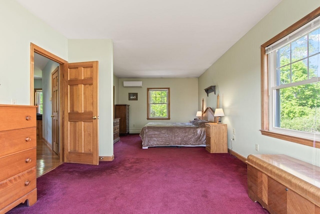 43 W Lynne Ave, Portland, ME 04103 - carpeted bedroom featuring a wall mounted air conditioner and baseboards