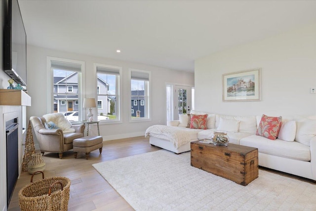 5 Cobblestone St Unit 53, Falmouth, ME 04105 - living area featuring light wood finished floors, baseboards, a fireplace, and recessed lighting