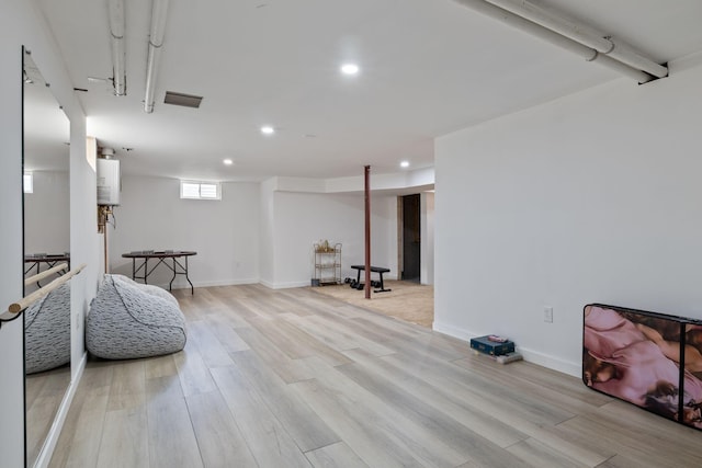 5 Cobblestone St Unit 53, Falmouth, ME 04105 - sitting room featuring recessed lighting, light wood-type flooring, baseboards, and water heater