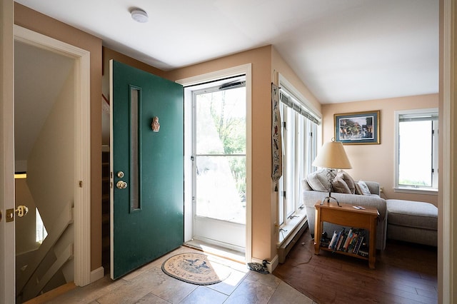7 Goodridge Dr Unit 7, Naples, ME 04055 - foyer with plenty of natural light and wood finished floors