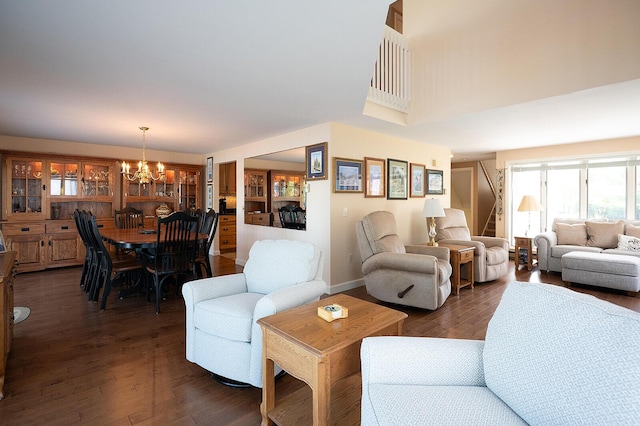 7 Goodridge Dr Unit 7, Naples, ME 04055 - living area with a chandelier, stairs, dark wood-style floors, and baseboards