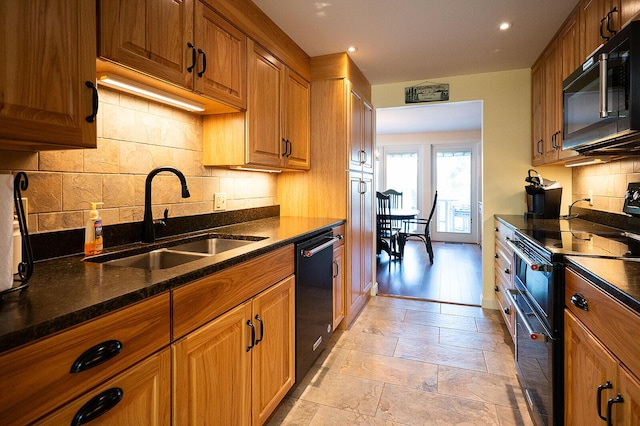 7 Goodridge Dr Unit 7, Naples, ME 04055 - kitchen with black appliances, a sink, brown cabinetry, backsplash, and recessed lighting
