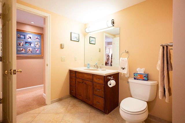 7 Goodridge Dr Unit 7, Naples, ME 04055 - bathroom featuring vanity, toilet, tile patterned floors, and baseboards