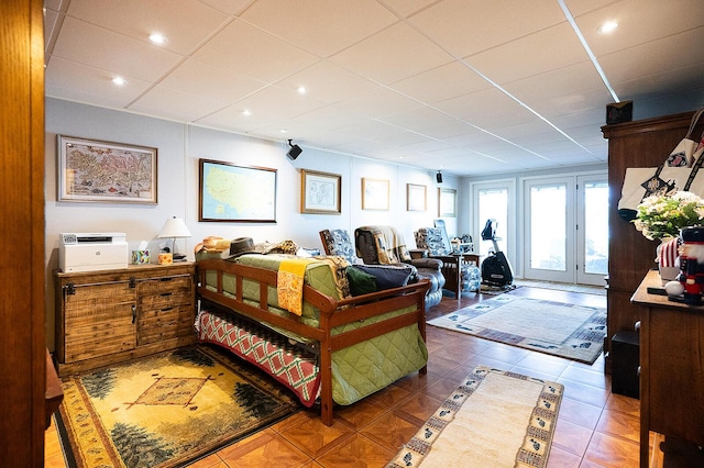 7 Goodridge Dr Unit 7, Naples, ME 04055 - bedroom with access to outside, a paneled ceiling, and tile patterned floors