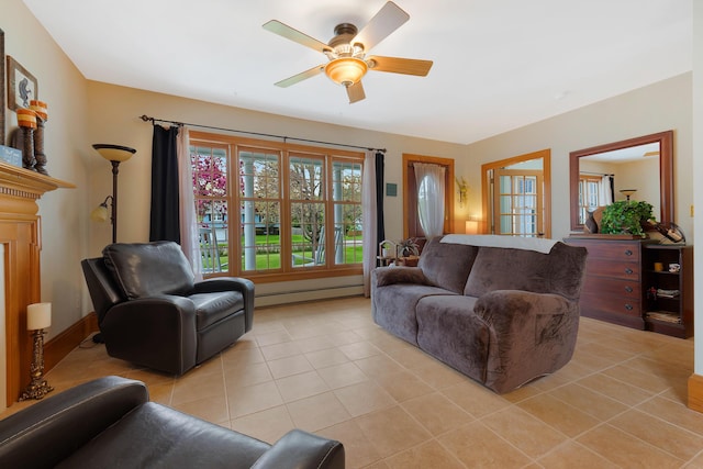 96 Grove St, Lewiston, ME 04240 - living area featuring light tile patterned floors, a ceiling fan, and a baseboard heating unit
