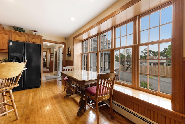 96 Grove St, Lewiston, ME 04240 - dining area featuring light wood finished floors, recessed lighting, and baseboard heating