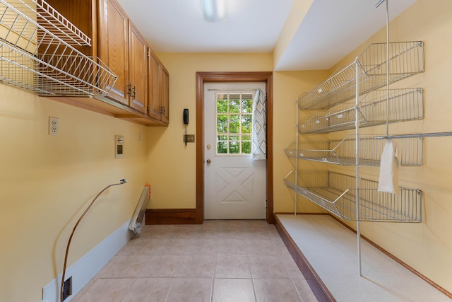 96 Grove St, Lewiston, ME 04240 - doorway with baseboards and light tile patterned flooring