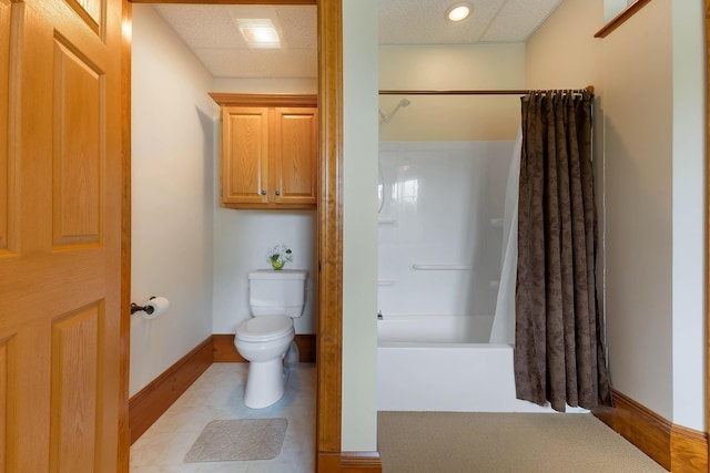96 Grove St, Lewiston, ME 04240 - bathroom featuring toilet, shower / bathtub combination with curtain, and baseboards
