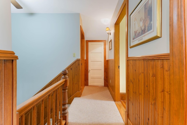 96 Grove St, Lewiston, ME 04240 - hall featuring wainscoting, an upstairs landing, light carpet, and wood walls