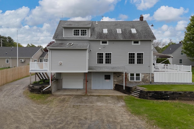 96 Grove St, Lewiston, ME 04240 - back of house with dirt driveway, an attached garage, a chimney, a shingled roof, and a deck
