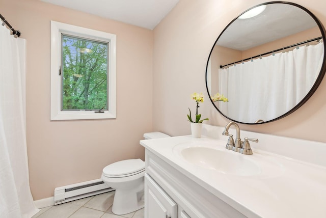 17 Graham Rd Unit 17, Westbrook, ME 04092 - full bathroom with a baseboard heating unit, tile patterned floors, vanity, toilet, and baseboards