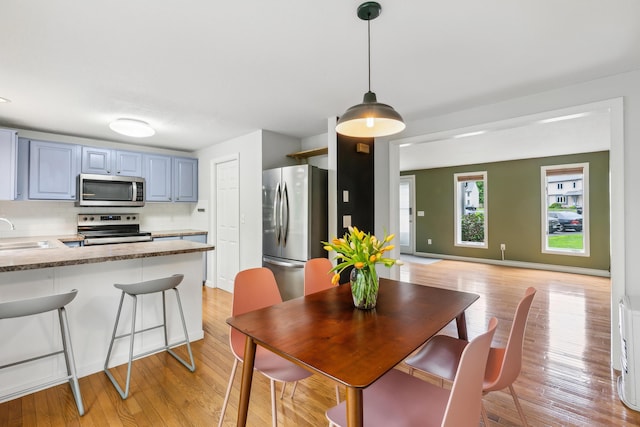 17 Graham Rd Unit 17, Westbrook, ME 04092 - dining area featuring light wood finished floors and baseboards