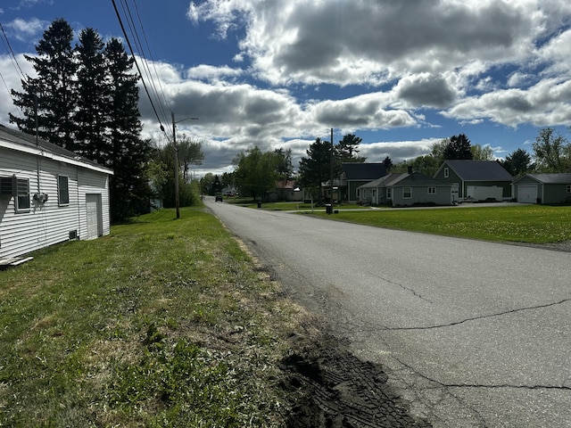 29 Exchange St, Presque Isle, ME 04769 - view of asphalt street featuring a residential view