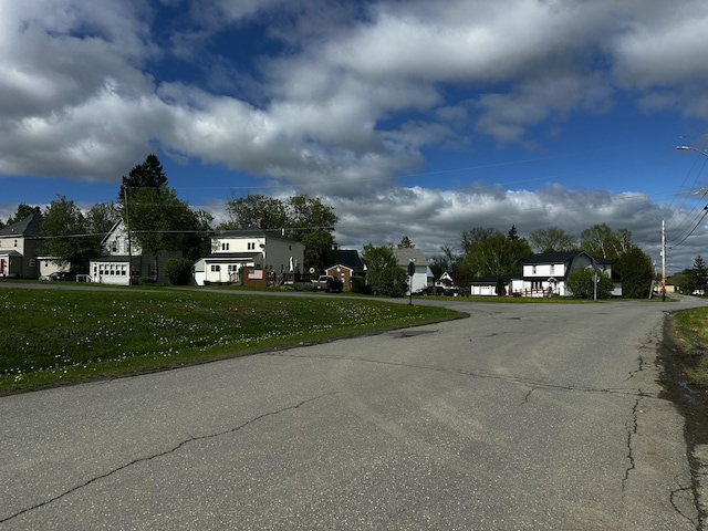 29 Exchange St, Presque Isle, ME 04769 - view of asphalt street featuring street lighting