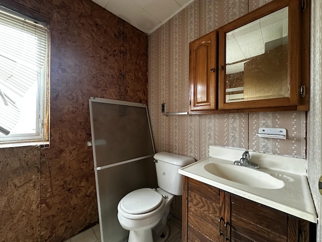 29 Exchange St, Presque Isle, ME 04769 - bathroom featuring vanity, toilet, wallpapered walls, and tile patterned flooring