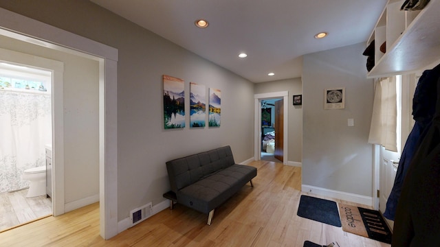 17 Wellman St, Lewiston, ME 04240 - living area with light wood finished floors, recessed lighting, and baseboards