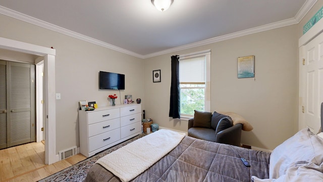 17 Wellman St, Lewiston, ME 04240 - bedroom featuring ornamental molding, light wood-style floors, and baseboards