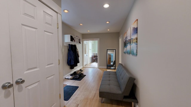 17 Wellman St, Lewiston, ME 04240 - hallway with recessed lighting, light wood finished floors, and baseboards
