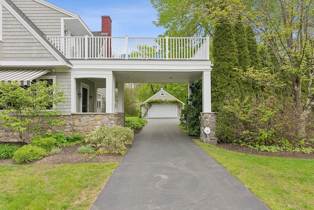 71 N St, Kennebunkport, ME 04046 - view of property's community with an outdoor structure, a lawn, and driveway